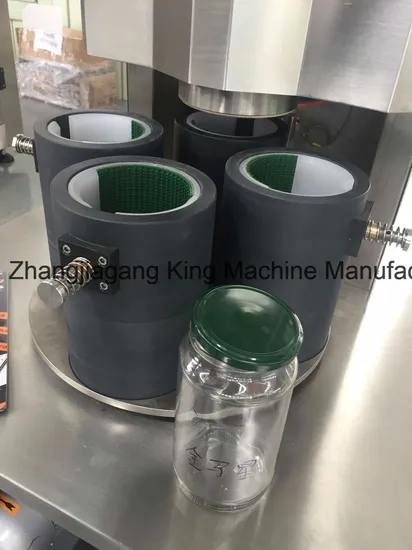 Machine de couvercle à poussière automatique Machine de coiffage en verre de compagnie en plastique Fermez la machine à coincements de bouteille