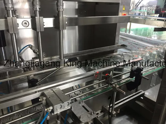 Machine de couvercle à poussière automatique Machine de coiffage en verre de compagnie en plastique Fermez la machine à coincements de bouteille